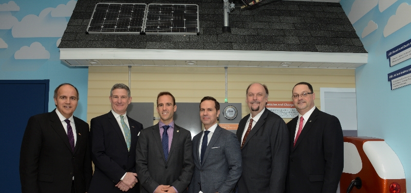 From left: NB Power president and CEO Gaëtan Thomas; Opportunities NB CEO Stephen Lund; Fredericton MP Matt DeCourcey; Siemens Canada president and CEO Robert Hardt; David Burns, vice-president of research at the university and Energy and Mines Minister Donald Arseneault.